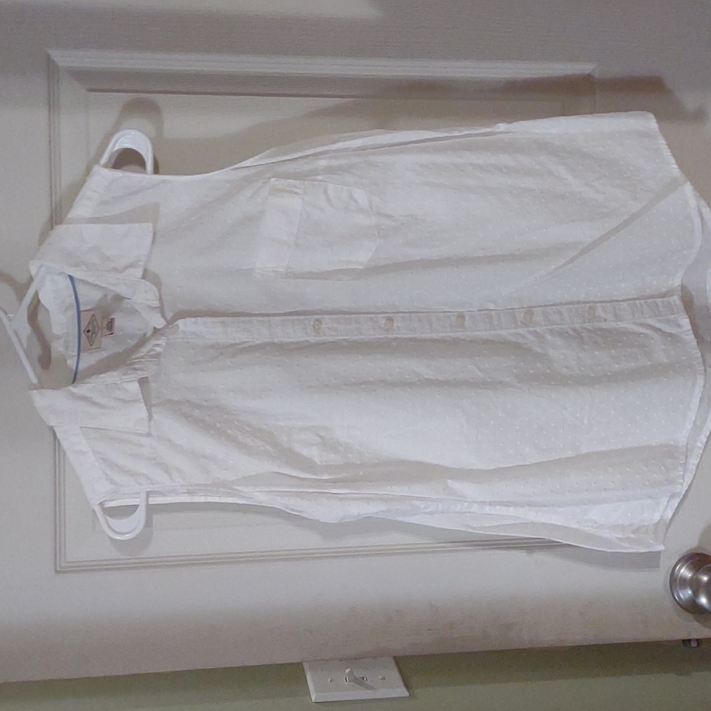 St. John's Bay, white sleeveless blouse with front pocket and Swiss dots.